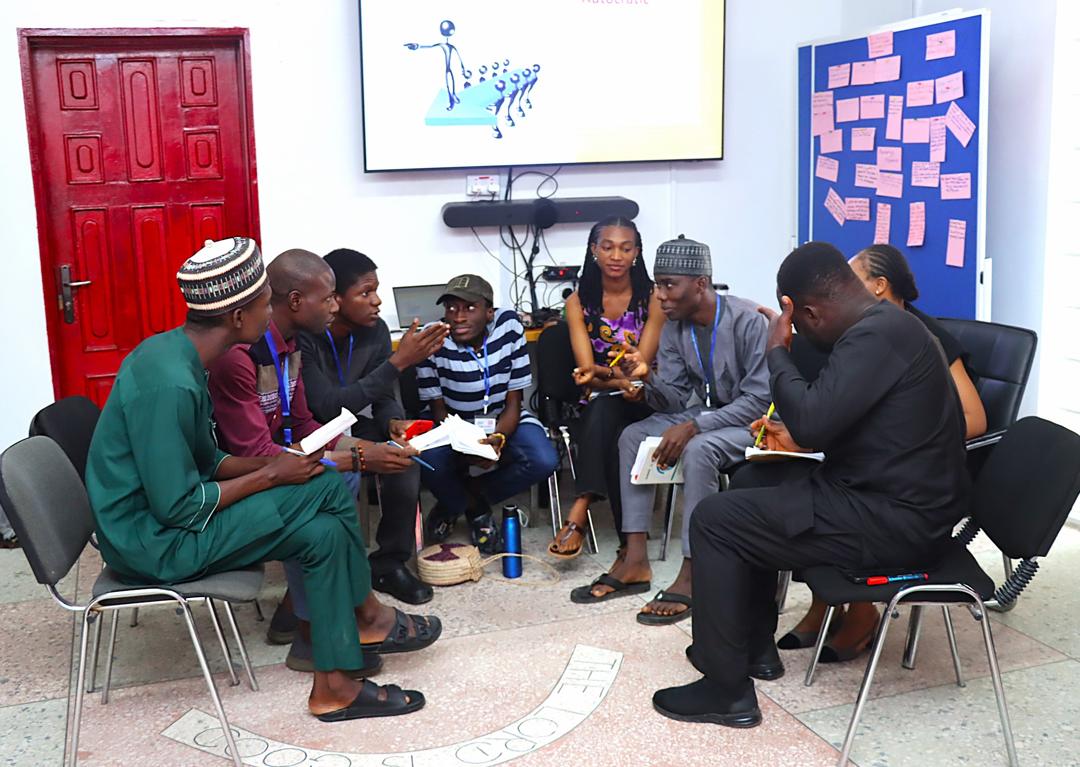 Dave contributing during a public dialogue with peers