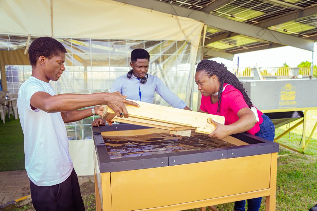 Dave and Blessing forming paper for Nature Packs