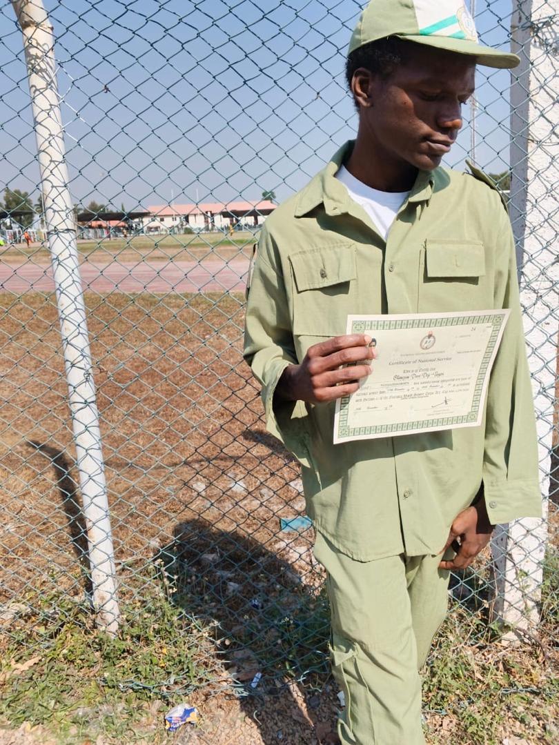 Dave with NYSC discharge certificate