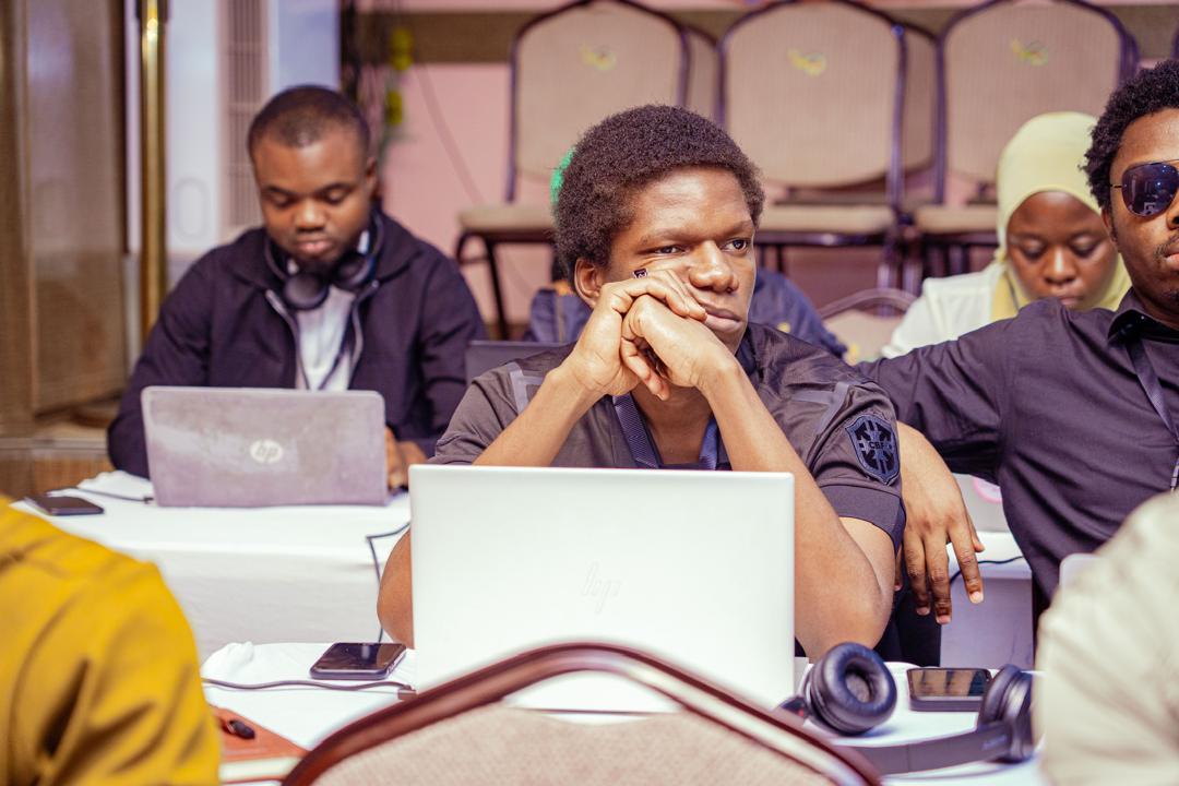 Dave working with laptop during an AI entrepreneurial leadership program