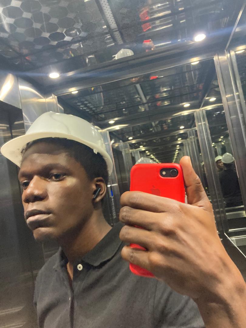 Dave wearing a helmet on site